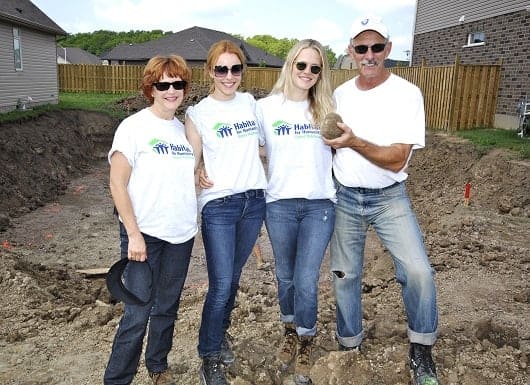 Rachel McAdams, pictured with her mother, father, and sister Kayleen for Habitat For Humanity