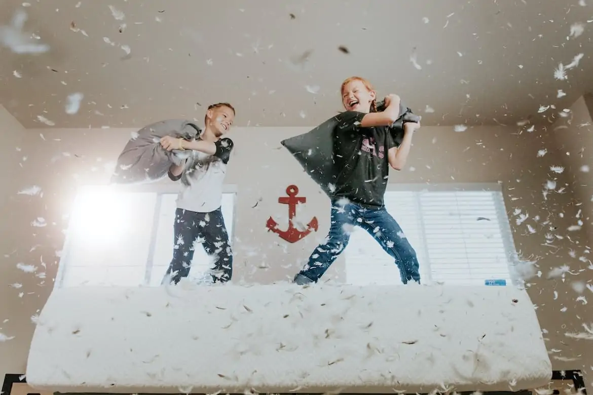 kids having a pillowfight