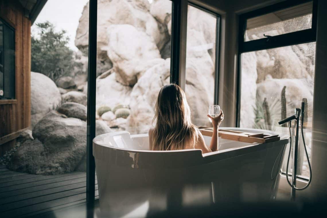 woman in bath tub at spa