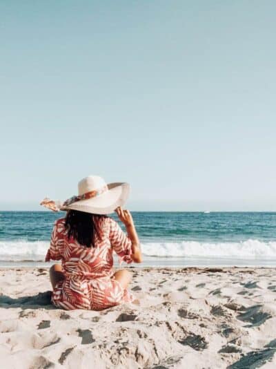 woman on the beach in a hat in santa barbara