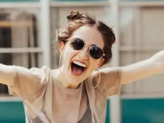 happy woman in sunglasses