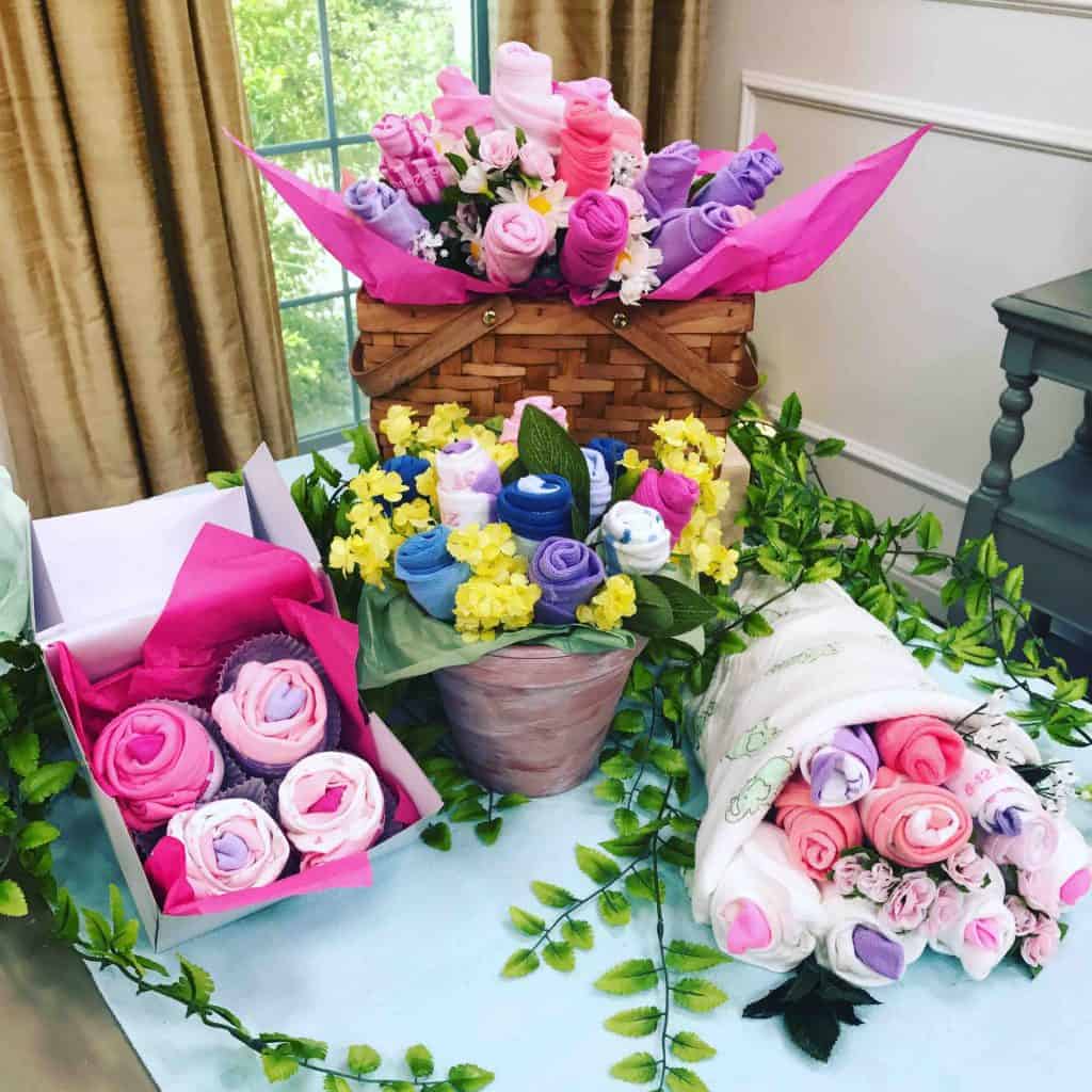 10 Creative DIY Baby Shower Gift Ideas DIY Baby Onesie and Sock Cupcakes and Bouquet