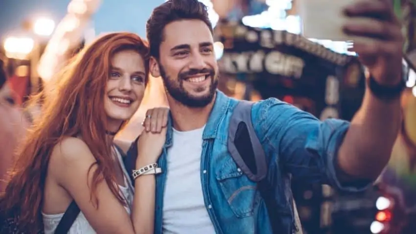 happy couple smiling for a selfie