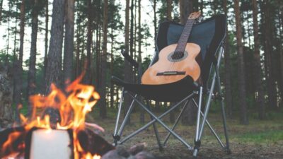 guitar near campfire
