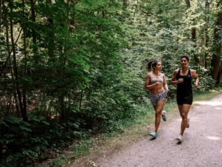 two women going for a run in a park cardio -  - 7 Ways To Create a Functional Fitness Routine