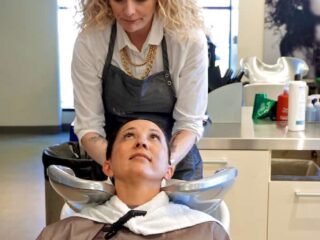 woman washing clients hair