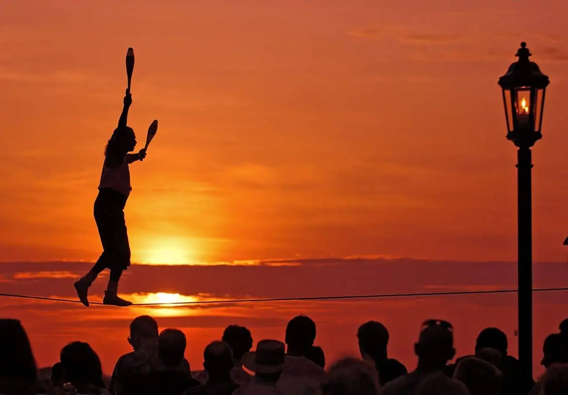 sunset celebration KEY WEST tightrope walker